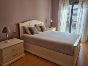 Кровать или кровати в номере La Maison