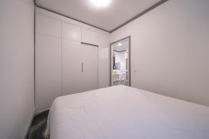 Voodi või voodid majutusasutuse Klaipedos Apartment - Lollo Luxury toas