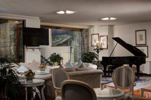 Телевизор и/или развлекательный центр в Hotel Cenobio Dei Dogi