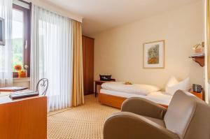 Postel nebo postele na pokoji v ubytování WILLINO Privathotel