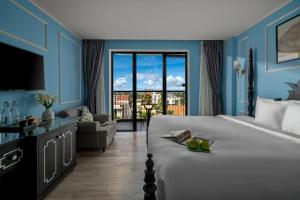 Postel nebo postele na pokoji v ubytování Hotel Del Luna Boutique