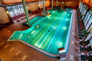 an overhead view of an indoor swimming pool at Chalet Bystra - wellness 5 min-washer-game room-view-5 bedrooms in Mýto pod Ďumbierom