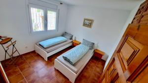 Ένα ή περισσότερα κρεβάτια σε δωμάτιο στο MEDDAYS VILLA SOL +26 φωτογραφίες