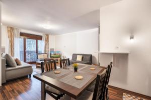 A seating area at Apartment Amelia Tale, View of Chopok from large terrace, In the nature