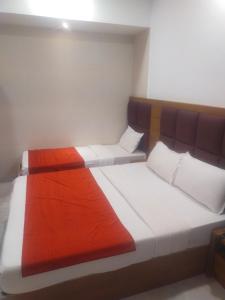 Postel nebo postele na pokoji v ubytování Hotel airport annex