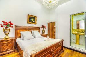 Postel nebo postele na pokoji v ubytování Sera Boutique Hotel