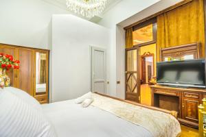 Postel nebo postele na pokoji v ubytování Sera Boutique Hotel