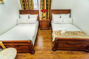 Postel nebo postele na pokoji v ubytování Sera Boutique Hotel