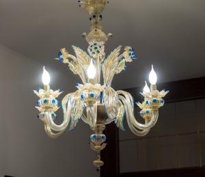 a chandelier is hanging from a ceiling at Ca' dei Ferro, MURANO Island, Venice in Murano