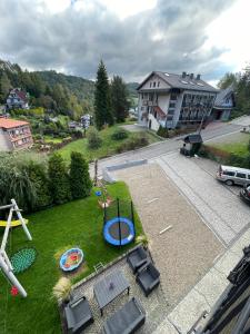 Detský kútik v ubytovaní Willa Jolka - parking bezplatny, plac zabaw, wiata grillowa