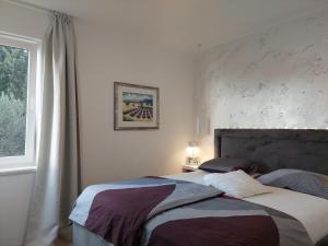 Krevet ili kreveti u jedinici u objektu Apartmani Basioli Zadar