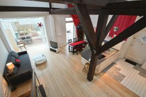 an overhead view of a living room with a couch at Packhaus Norderney in Norderney