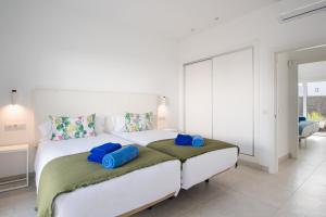 Letto o letti in una camera di Blancazul Villa Jable