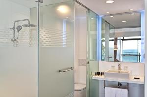 a bathroom with a shower and a sink at Don Gregory by Dunas - Adults Only in San Agustin
