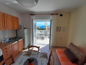 Kuchyň nebo kuchyňský kout v ubytování Apartments Pavelic