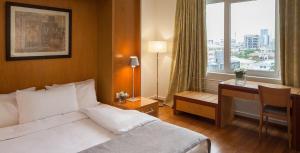 Eko Hotel Suites客房内的一张或多张床位