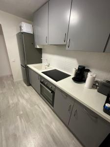Kuchyň nebo kuchyňský kout v ubytování Apartamento Suzanna