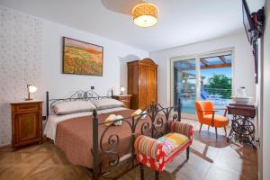 Postel nebo postele na pokoji v ubytování Villa Principe by Villa Plus + 9 fotografií