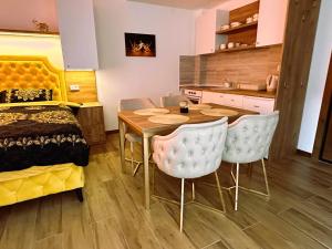 Kuchyň nebo kuchyňský kout v ubytování Zlatni apartman Borovi