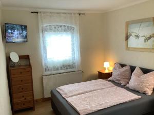 Ένα ή περισσότερα κρεβάτια σε δωμάτιο στο Zimmer Wolkenlos +16 φωτογραφίες