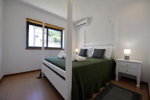 En eller flere senge i et værelse på Villa 298 + 15 billeder