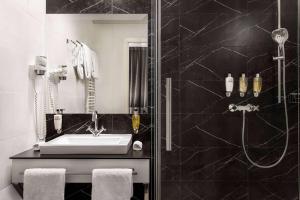 Kúpeľňa v ubytovaní Wyndham Grand Krakow Old Town