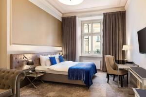 Posteľ alebo postele v izbe v ubytovaní Wyndham Grand Krakow Old Town