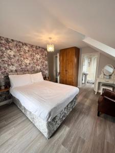 Voodi või voodid majutusasutuse Fiddlestone Bar and B&B toas