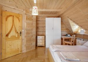Posteľ alebo postele v izbe v ubytovaní Rezydencja Gubałówka sauna widok