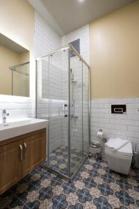 Ένα μπάνιο στο Level Suites - 203