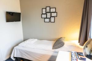 TV a/nebo společenská místnost v ubytování Hotel Herning