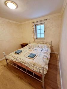 Postel nebo postele na pokoji v ubytování Apartmánový dom provence Bystrá Chopok
