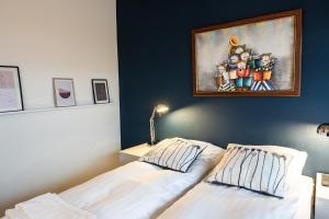 Postel nebo postele na pokoji v ubytování Hotel Herning