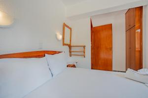 Postel nebo postele na pokoji v ubytování Athina Villas