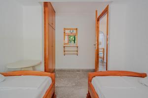 Postel nebo postele na pokoji v ubytování Athina Villas