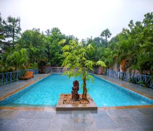 Bazén v ubytování Mango Hill La Serene Puducherry nebo v jeho okolí