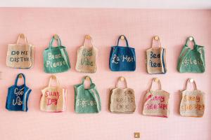 a bunch of bags with the words back to school on them at The Nici in Bournemouth