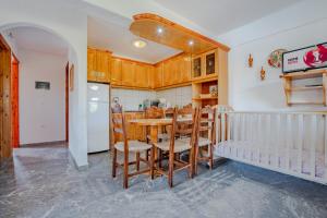 Kuchyň nebo kuchyňský kout v ubytování Athina Villas