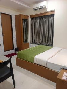 Postel nebo postele na pokoji v ubytování Hotel airport annex