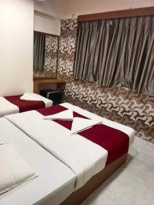 Postel nebo postele na pokoji v ubytování Hotel airport annex