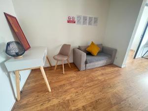 Część wypoczynkowa w obiekcie Mon Palmier Grand Appartement Parking Un-Séjour-à-Part