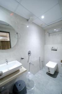 Koupelna v ubytování HOTEL ALFA EXECUTIVE