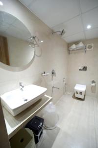 Koupelna v ubytování HOTEL ALFA EXECUTIVE