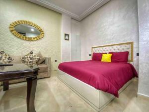 Postel nebo postele na pokoji v ubytování Velasquez Appart Hotel 4