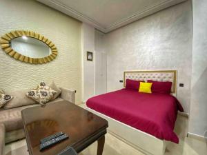 Postel nebo postele na pokoji v ubytování Velasquez Appart Hotel 4