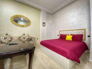 Postel nebo postele na pokoji v ubytování Velasquez Appart Hotel 4