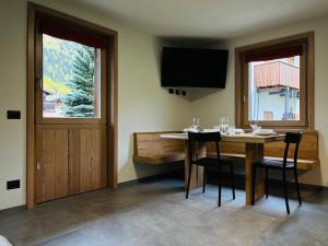 TV a/nebo společenská místnost v ubytování Chalet Girasole