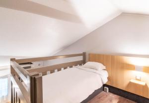 Postel nebo postele na pokoji v ubytování B&B HOTEL Limoges 2