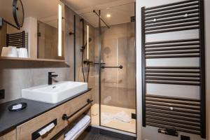 Ett badrum på Hotel Königssee