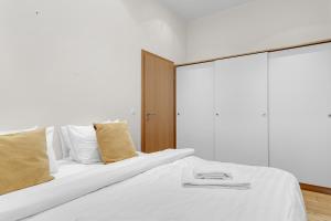 Postel nebo postele na pokoji v ubytování Máni Apartments